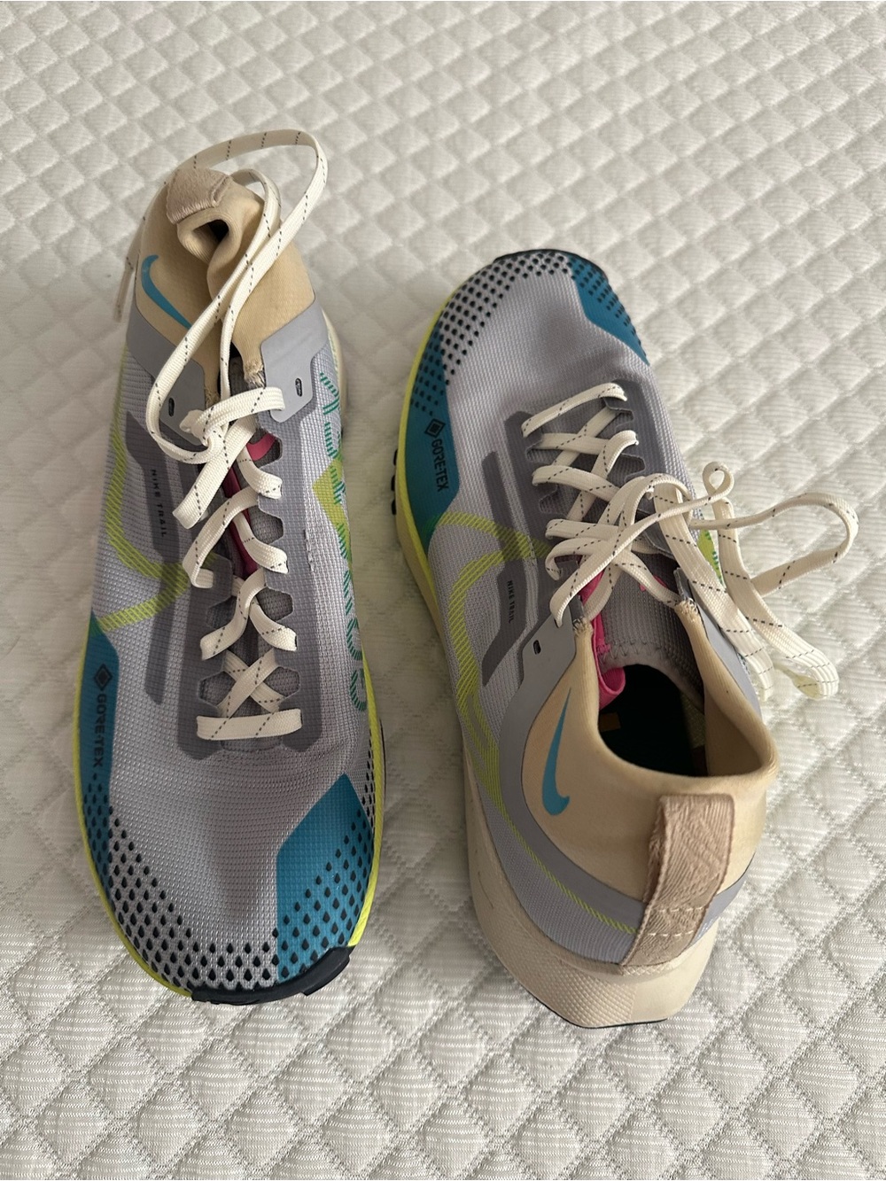 Nike Light Gray Running Sneakers with Blue and Neon Yellow Accents